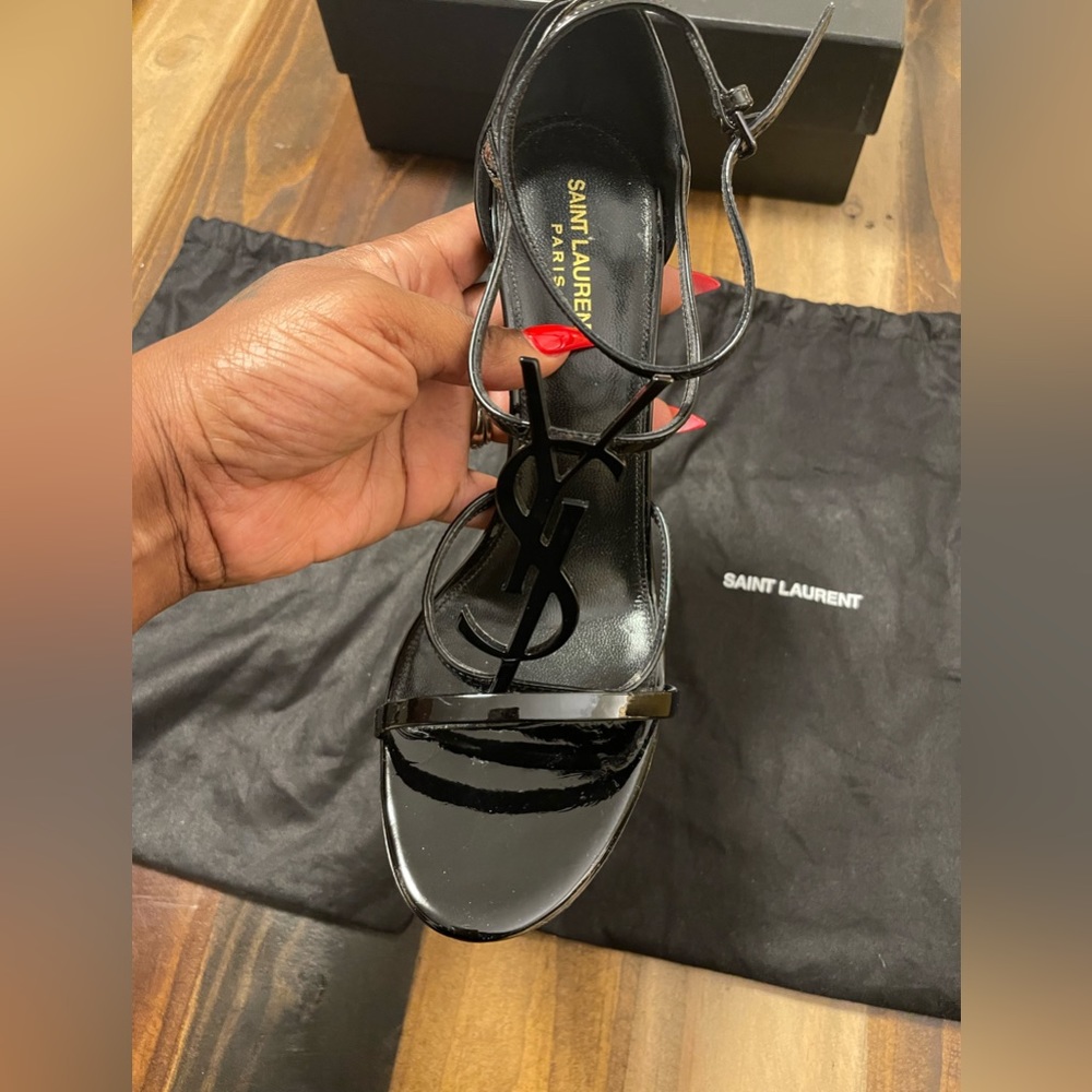 SAINT LAURENT
Calfskin Cassandra 100 Sandals 42 Black. Worn once for 20 mins.